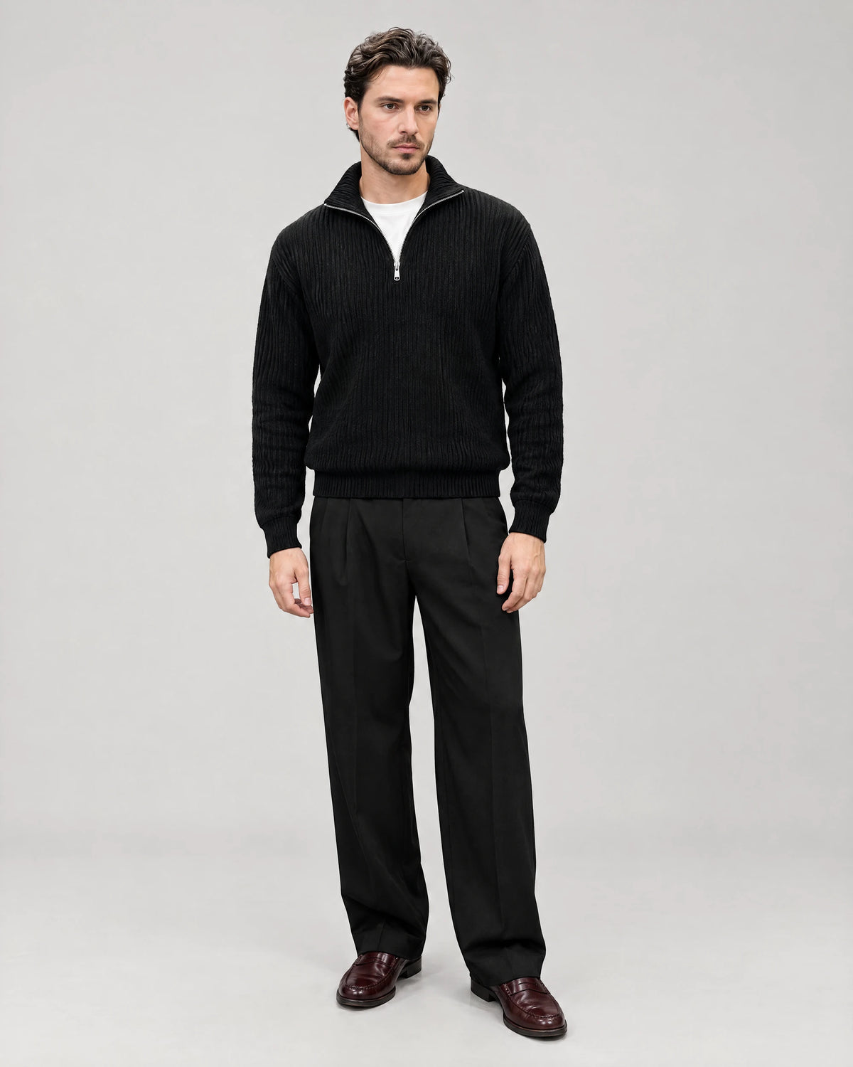 Gramado Men's Ribbed Quarter-Zip Pullover in Black, worn by model, full length